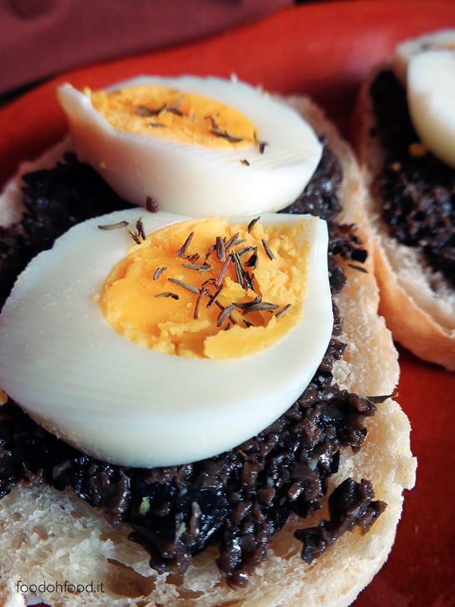 Black olive pate sandwich with hard boiled egg